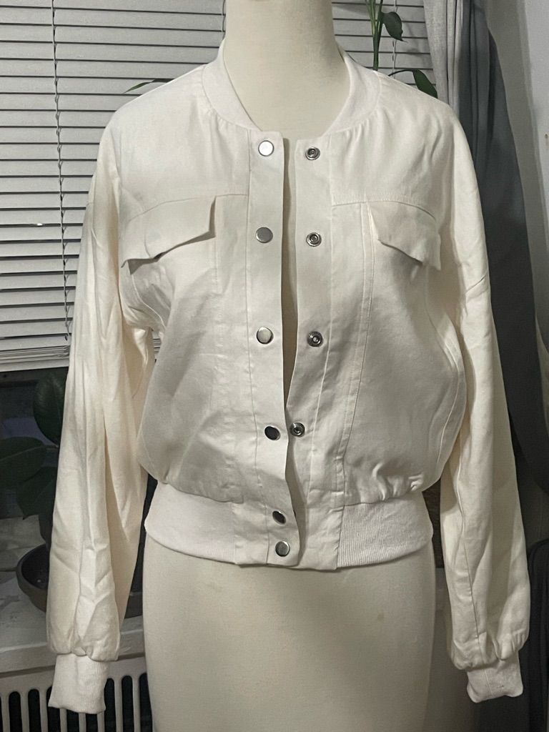 Central Park West Cream Bomber Jacket With Snap Front